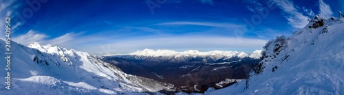 Aibga mountain peak covered by snow. Gorki Gorod ski resort. Sochi, Russia.