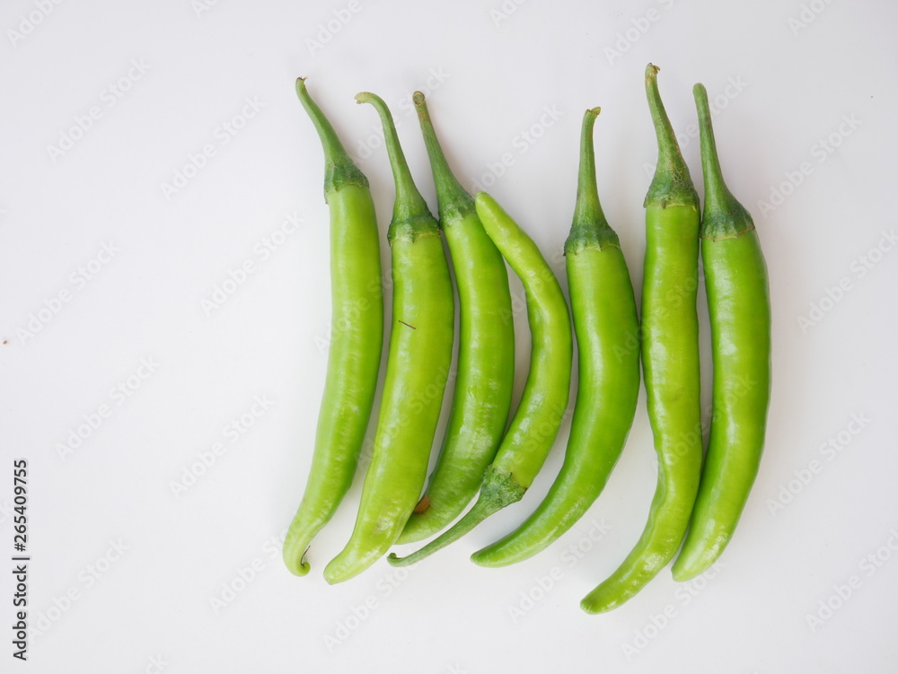 close up green chili pepper on white background close up green chili pepper on white background