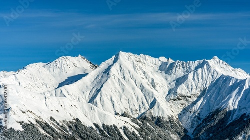 Awesome view of the Caucasus mountains covered by snow in the ski resort of Krasnaya Polyana  Russia.