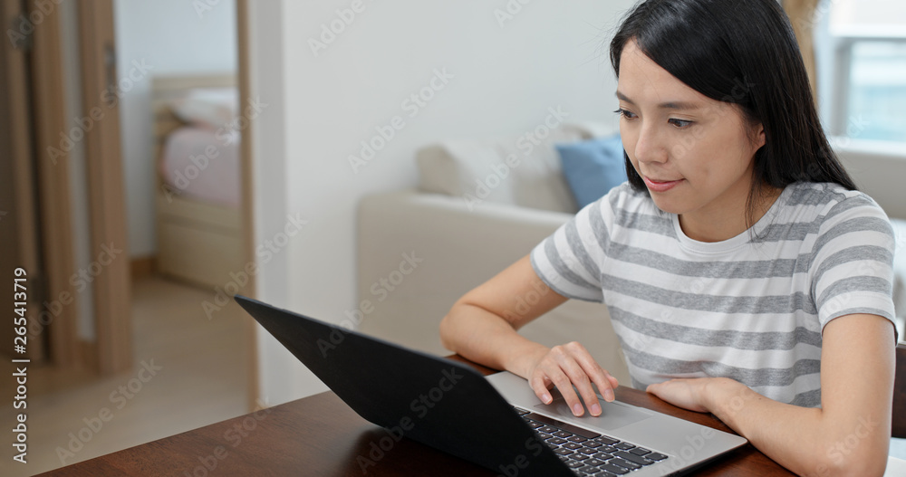 Woman work on computer at home