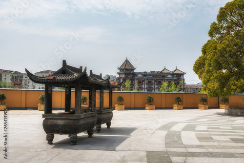 Square at Longhua Temple with incense burners . Shanghai. China. photo