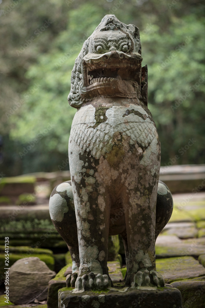 Beautiful lion sculpture at the Ta Prohm temple ruins in Siem Reap, Cambodia Beautiful lion sculpture at the Ta Prohm temple ruins in Siem Reap, Cambodia
