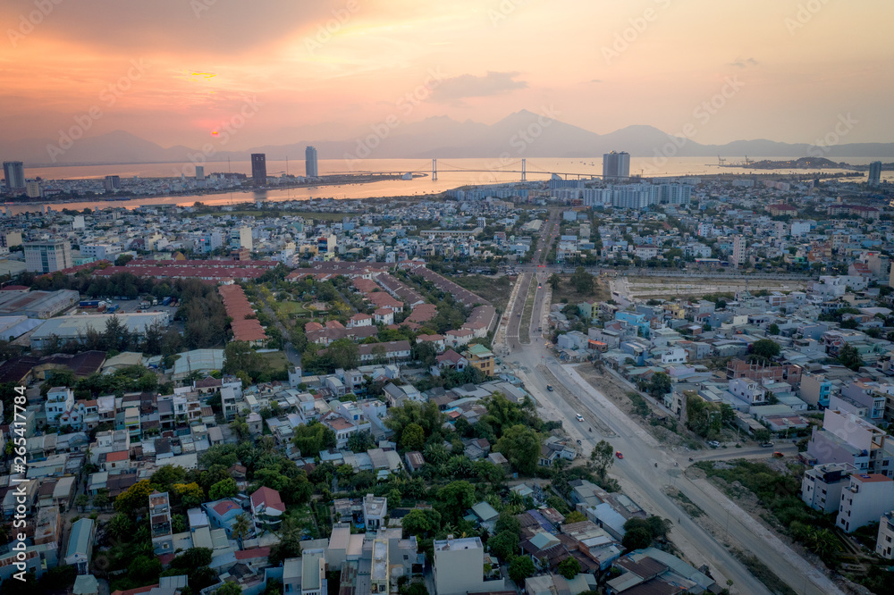 Aerial view of Danang, Vietnam urban sprawl at sunset