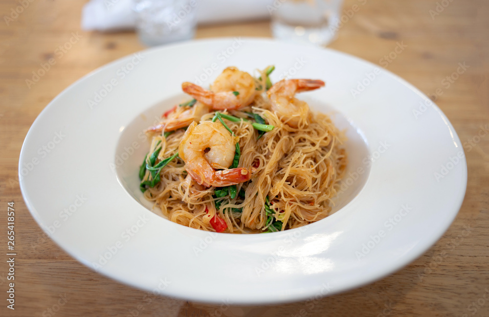 asian thai food noodle with shrimp and vegetable serve