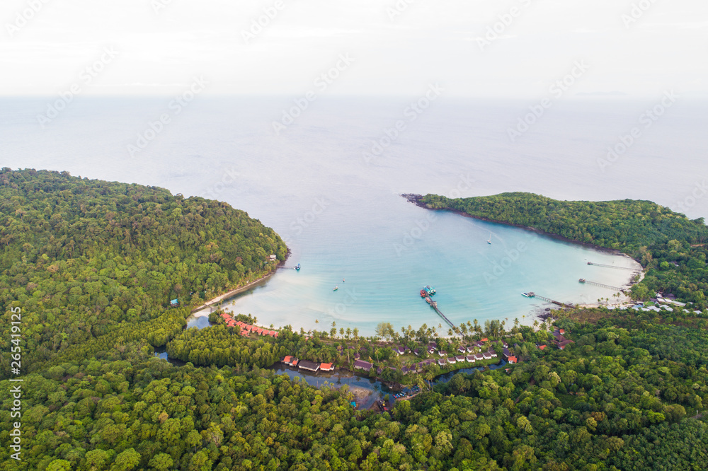 Aerial view sea island with tree forest on mountain