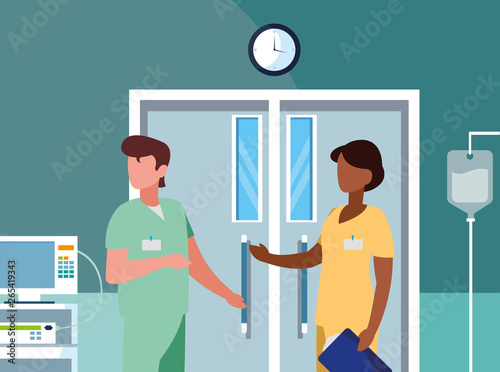 interracial couple medicine workers in operating theater