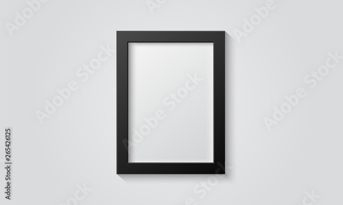Picture frame isolated on a wall. Black and white color. Realistic modern template. A4 vertical format. Mock up for pictures or photo. Beautiful minimal clean design. Eps 10 vector illustration.