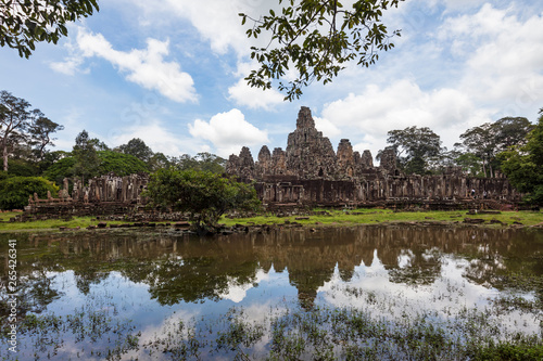 Beautiful Bayon temple reflected in the surrounding pond, Siem Reap, Cambodia © Michael Evans