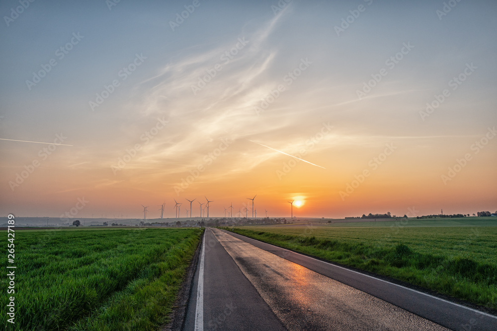 sunrise at a wind park in palatinate