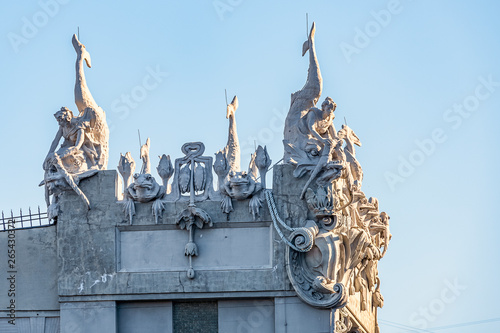 sculptures on the facade of the house with chimeras building across the street from President of Ukraine's office photo