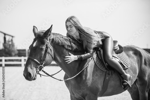 Woman and horse, lady have a hobby time, riding. Horses concept 