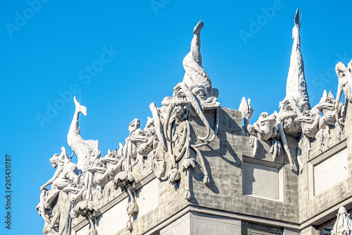 sculptures on the facade of the house with chimeras building across the street from President of Ukraine's office photo