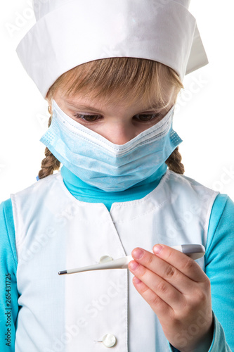 Close up photo of young female nurse examining the electronic thermometer, portrait white background photo