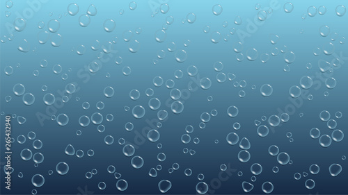 Accumulation of transparent water drops on blue background. Condensation of liquid on the surface.