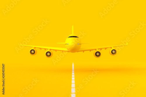 Yellow plane flying on the runway.
