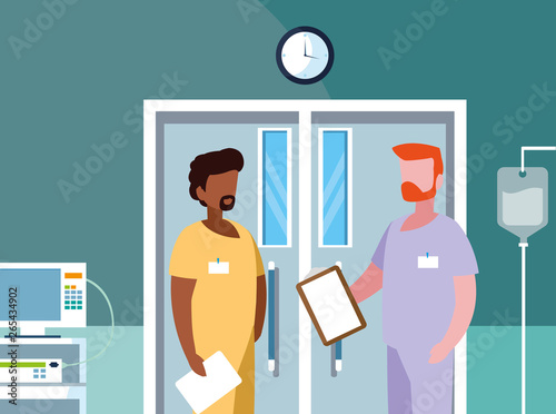 interracial male medicine workers in operating theater