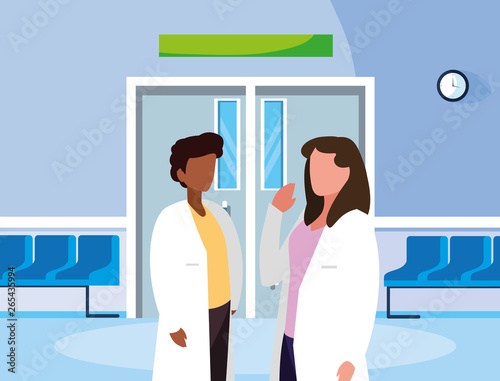 interracial couple medicine workers in the operating room entrance