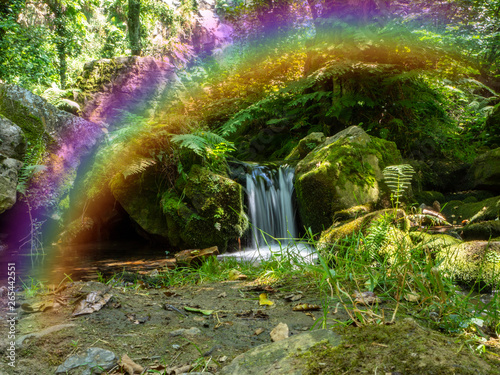 casacada de agua con arco iris photo