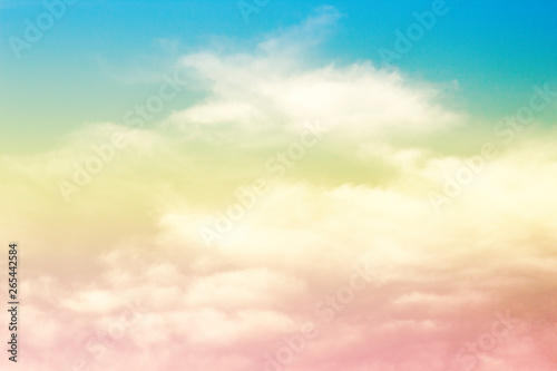 A soft fog cloud background white a pastel colored orage to blue gradient © Theeranad