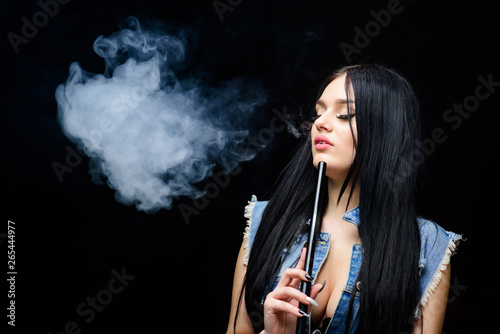 unhealthy addiction. Tabacco drug. Bad habit. Woman vapor. sexy woman smoking cigar. exhale smoke on black background. hookah bar. Electronic cigarette. Choose life not drugs
