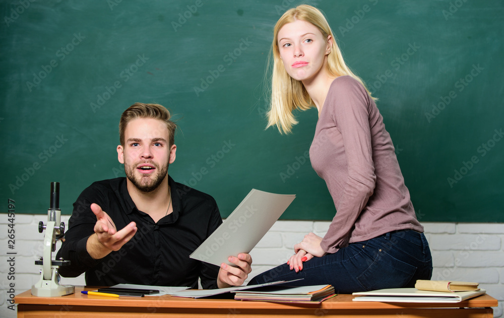 Students study before exam. Сertificate proves successfully passed university entrance exam. Students in classroom chalkboard background. Education concept. College entrance exam. Prepare final exam Students study before exam. Сertificate proves successfully passed university entrance exam. Students in classroom chalkboard background. Education concept. College entrance exam. Prepare final exam