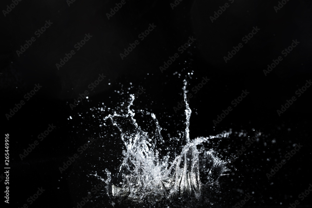 Naklejka premium water splash black background backdrop fresh feeling