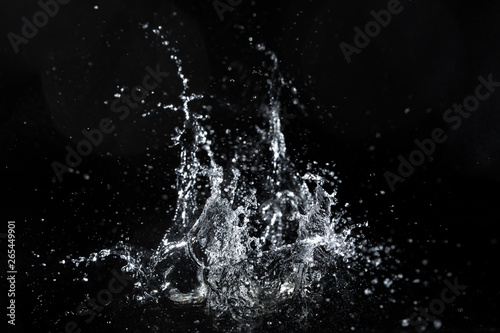 Fotografie, Obraz water splash black background backdrop fresh feeling