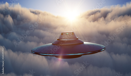 Fototapeta Naklejka Na Ścianę i Meble -  UFO alien spaceship is flying in sky above clouds at sunset. 3D rendered illustration.