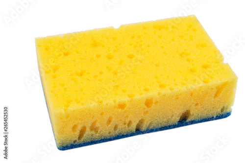 Macro shot of a surface of plastic yellow sponge isolated on white background. Close-up texture. Yellow scrub sponge. Sponge texture background. Yellow sponge for background