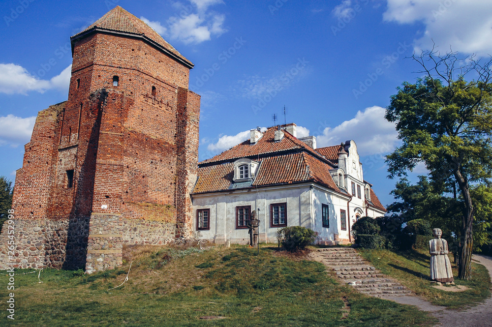 Manor house office and tower of Gothic Castle in Liw town in Masovian Voivodeship