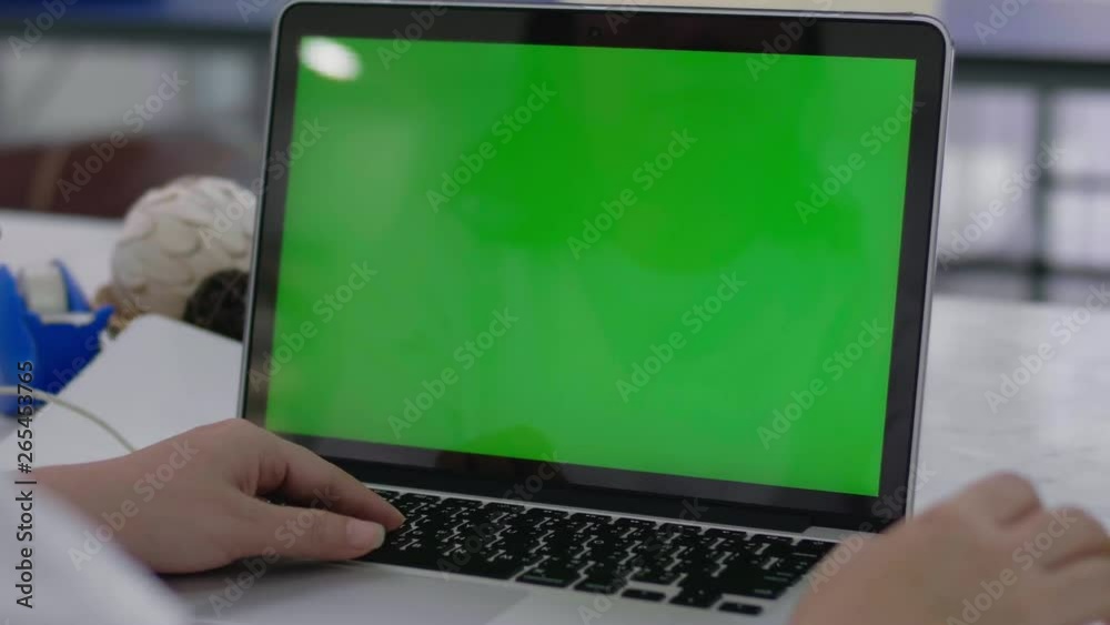 Woman working at home on with laptop green screen Woman working at home on with laptop green screen