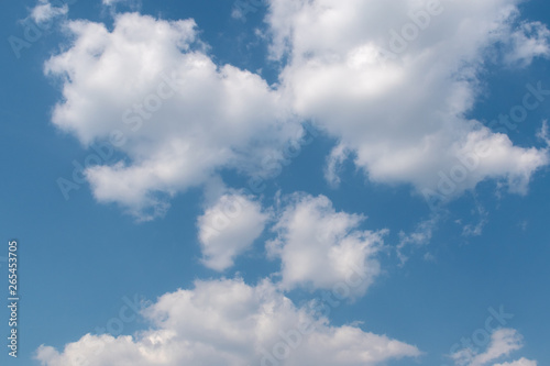 Beautiful fluffy clouds in the blue sky