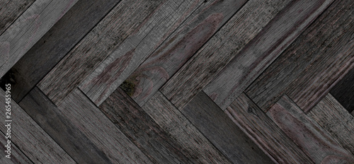 Old wooden boards texture for background. Dark grunge parquet flooring made from barn boards.