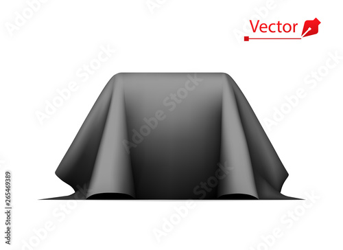 Object covered with black silk cloth. Empty podium or presentation. Secret box, cube hidden under satin fabric with drapery.