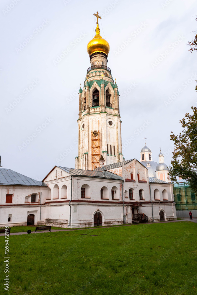 Birds flying around bell tower of St. Sophia Cathedral of Vologda