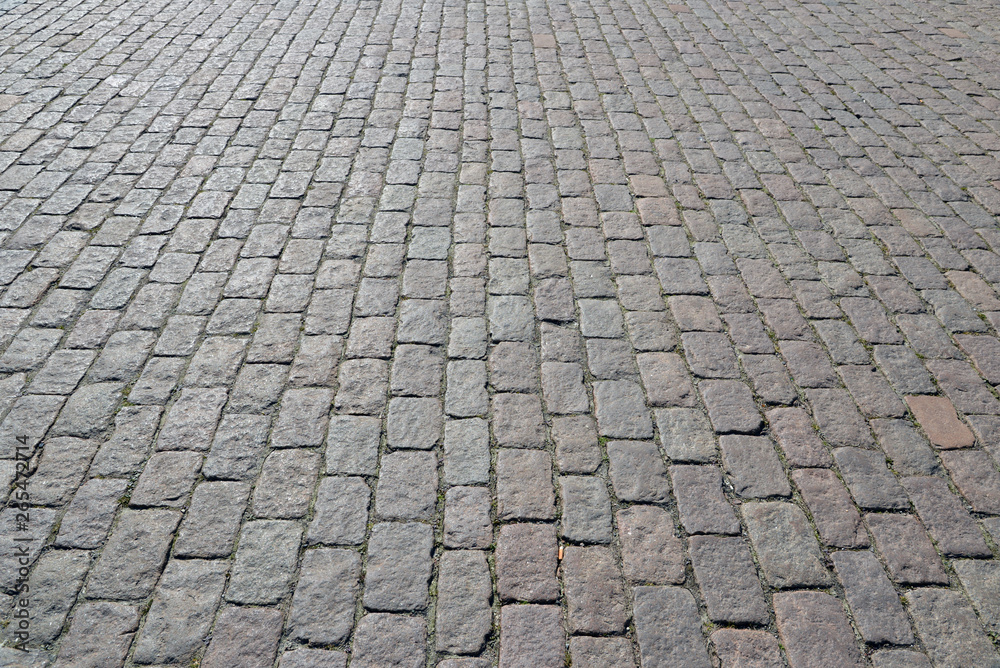 Old cobblestone pavement close-up.