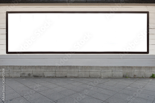 Large blank billboard on a street wall, banners with room to add your own text © RobbinLee