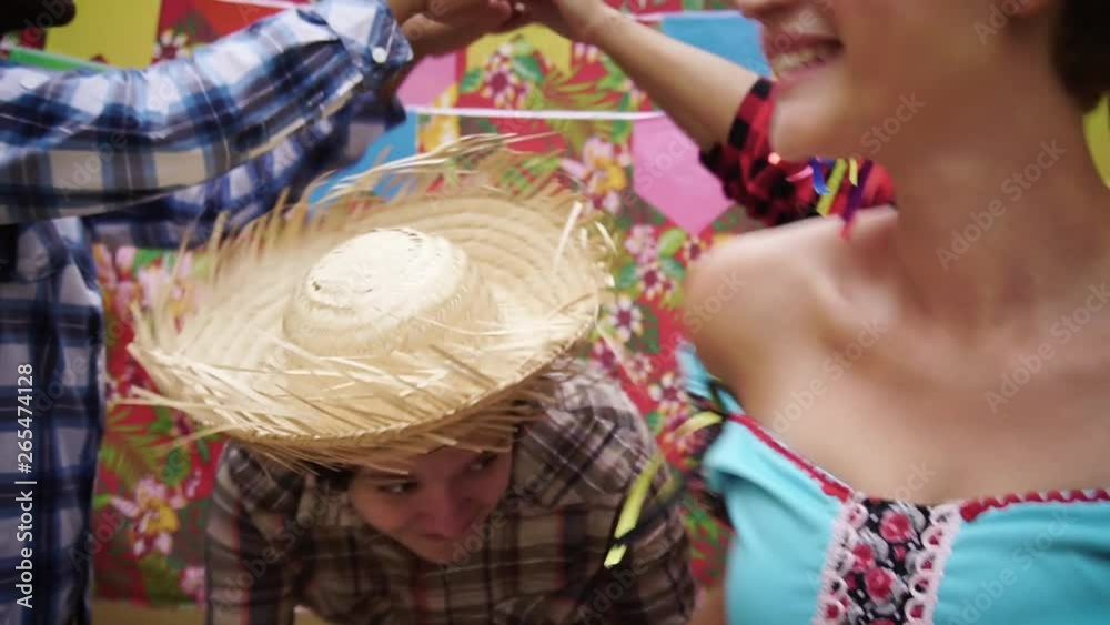 Couples dancing Quadrilha, a traditional style of Festa Junina: June  Party. Slow Motion