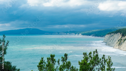 seascape on the background of mountainous terrain