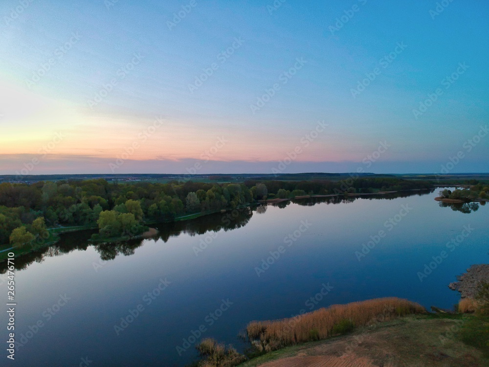 Fototapeta premium Aerial view of sunset over Nesvizh, Minsk Region, Belarus
