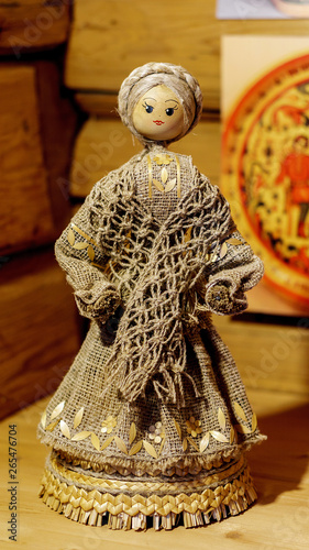 handmade straw doll in clothes made of natural materials