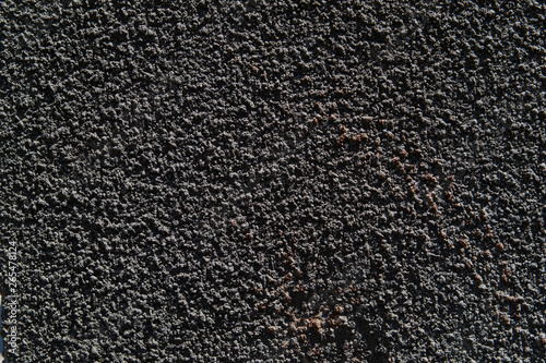 The texture of the concrete wall. A raw plaster wall background