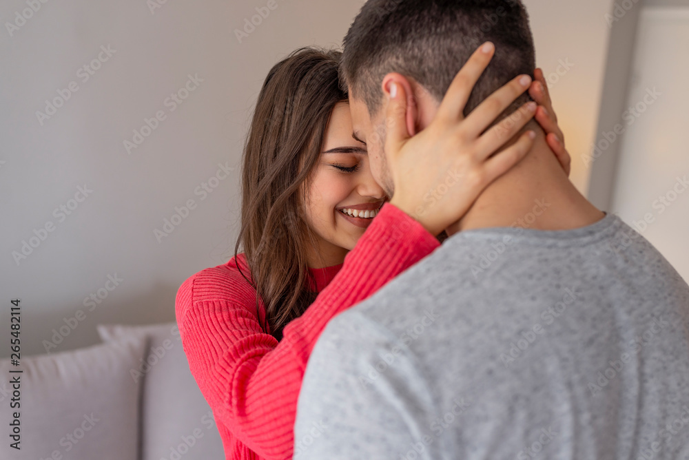 Happy couple in love hugging and sharing emotions. Real love. Beautiful young couple bonding and smiling. Beautiful couple in love Happy couple in love hugging and sharing emotions. Real love. Beautiful young couple bonding and smiling. Beautiful couple in love