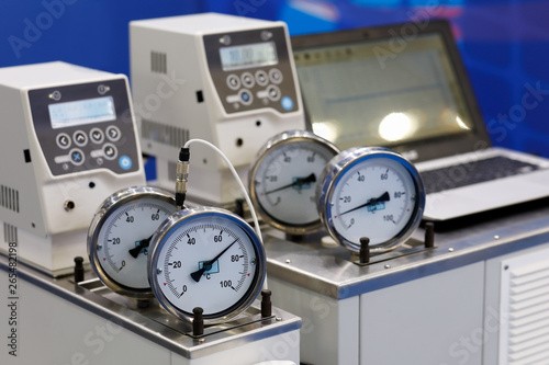 laboratory equipment with thermometer gauges photo