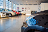 New cars at dealer showroom close view