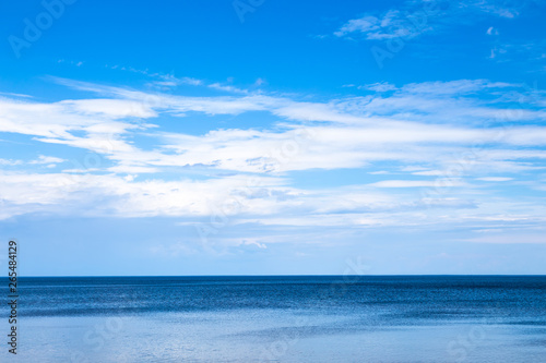 Beautiful blue seascape with white clouds in the sky. Great Ladoga lake  Karelian sea.