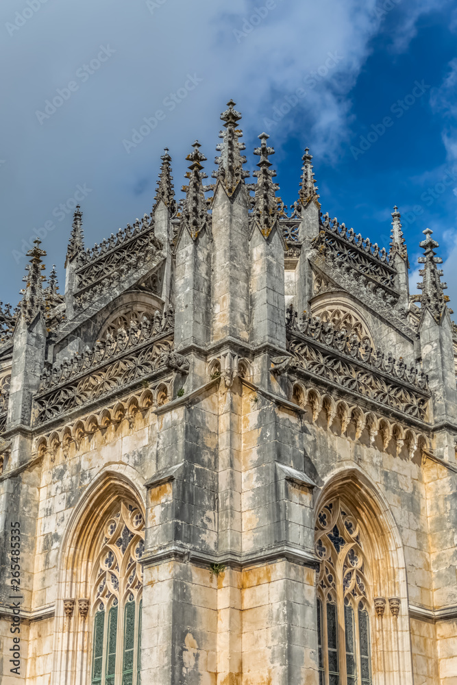 Detail view of the ornate Gothic exterior facade of the Monastery of Batalha, Mosteiro da Batalha, literally the Monastery of the Battle, is a Dominican convent, in Leiria, Portugal