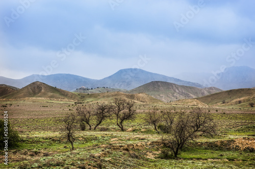 Landscape with dirt road and mountains