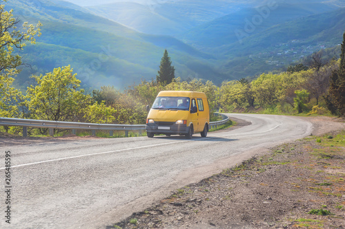 Wallpaper Mural minibus is moving along the road in the highlands. Torontodigital.ca