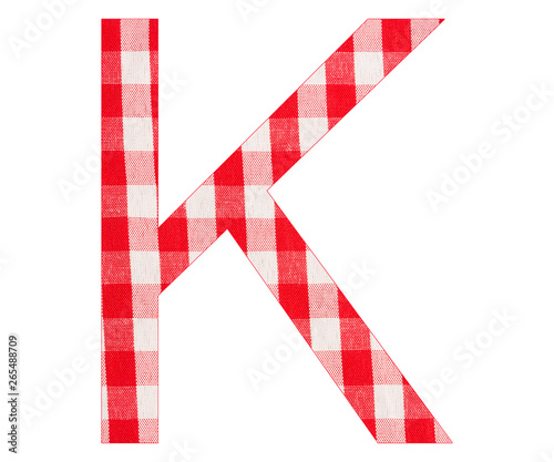 Letter K of the alphabet - Red checkered fabric tablecloth - White background